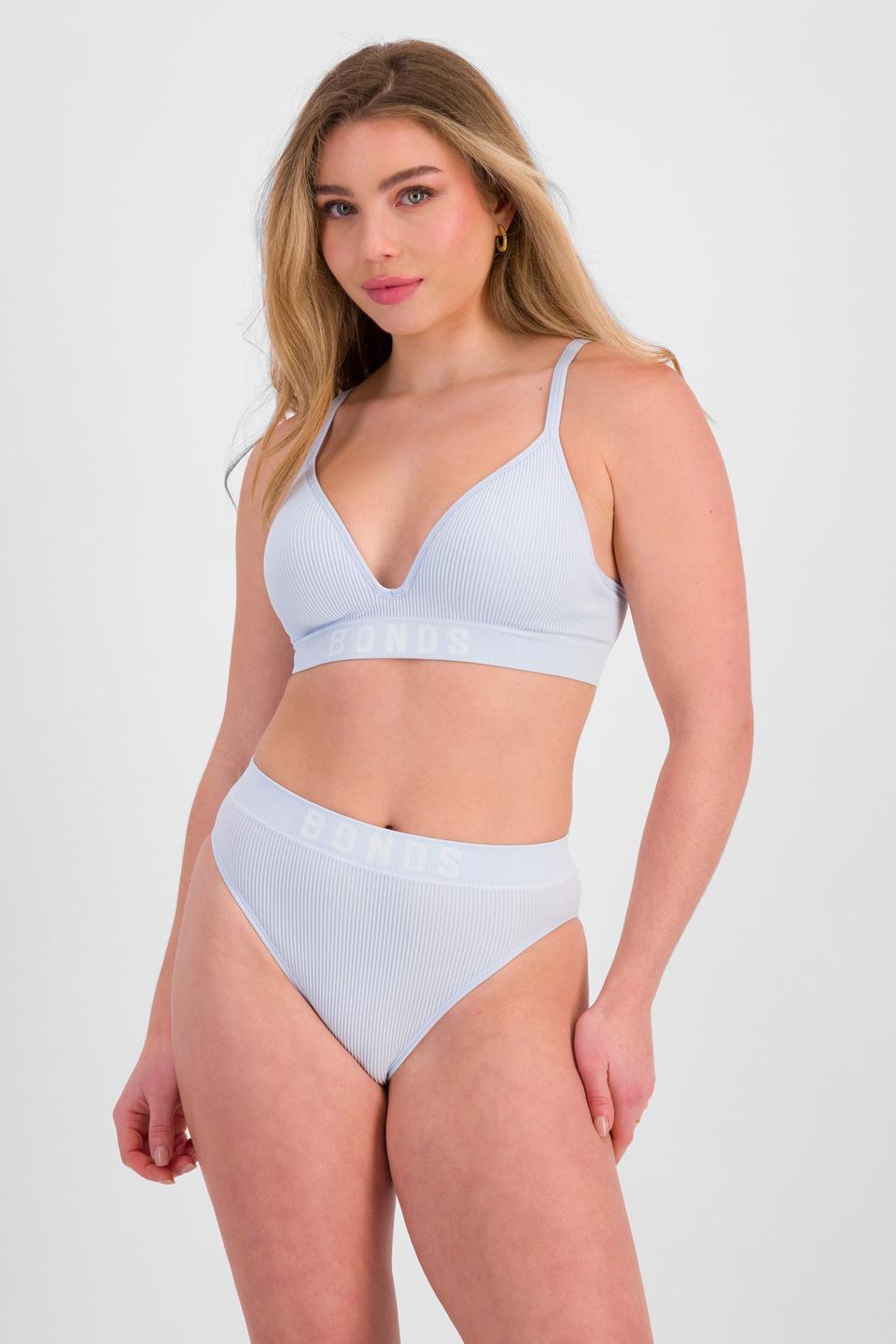 Sienna (She/Her) wears size 10 and is 164cm tall with cm chest and 71cm waist