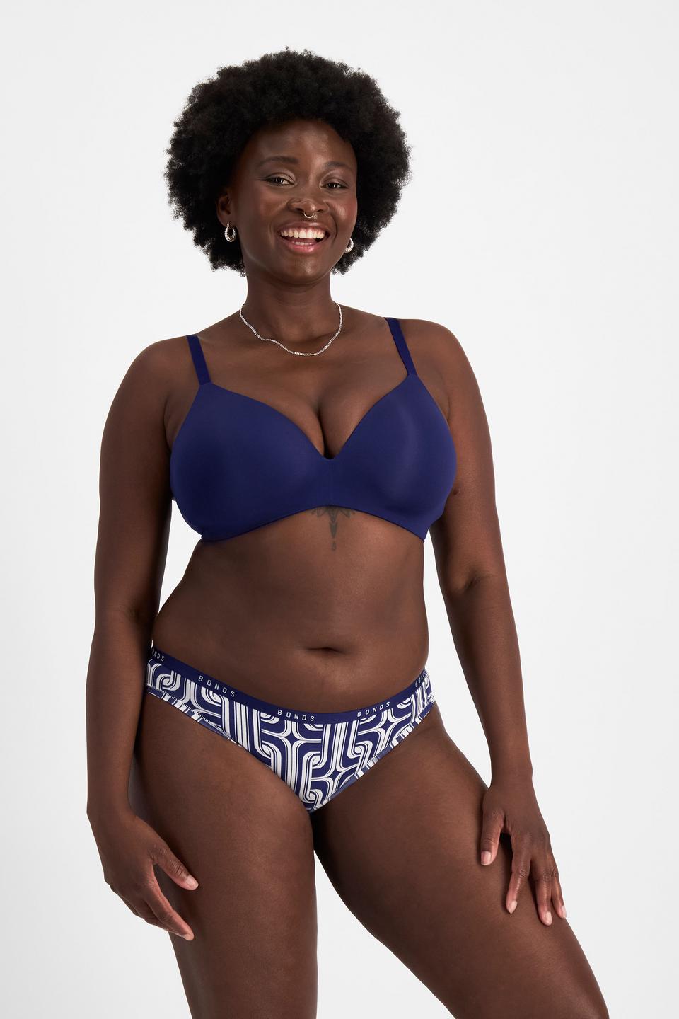 Nelly (She/Her) wears size 14 and is 173.73cm tall with 102cm chest and 84cm waist
