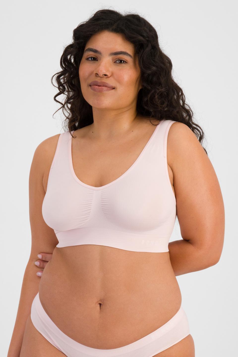 Laura (She/Her) wears size 14 and is 165cm tall with 94cm chest and 76cm waist