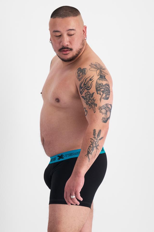 Mike (He/Him) wears size XL and is 180cm tall with 120cm chest and 96cm waist