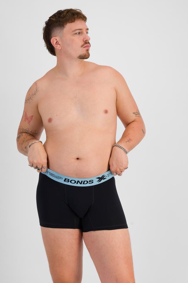 Jake (He/Him) wears size XL and is 195cm tall with 115cm chest and 106cm waist