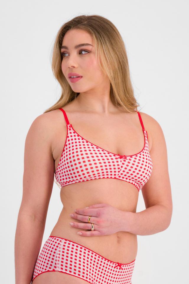 Sienna (She/Her) wears size 12 and is 164cm tall with cm chest and 71cm waist