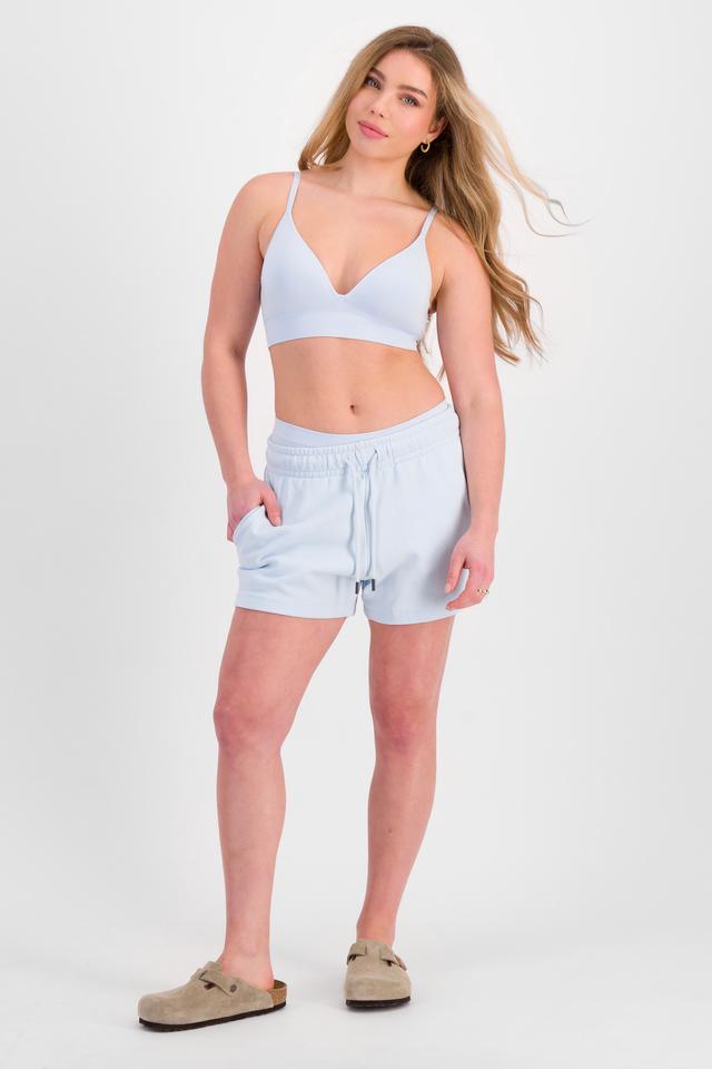 Sienna (She/Her) wears size 12 and is 164cm tall with cm chest and 71cm waist