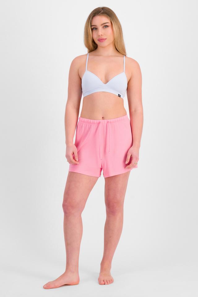 Sienna (She/Her) wears size 12 and is 164cm tall with cm chest and 71cm waist