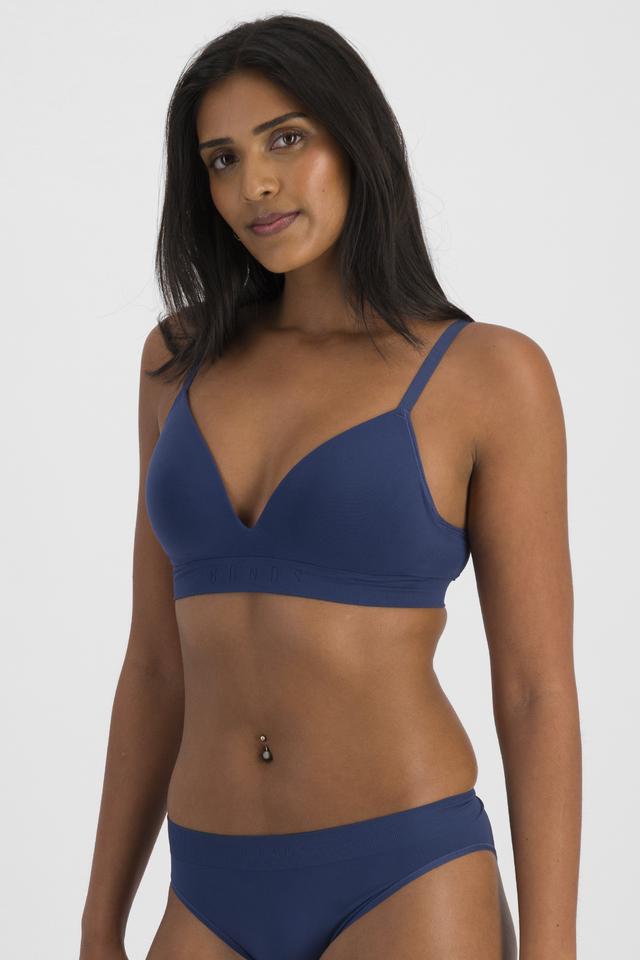 NAYA (She/Her) wears size 12B and is 174cm tall with 80cm chest and 63cm waist