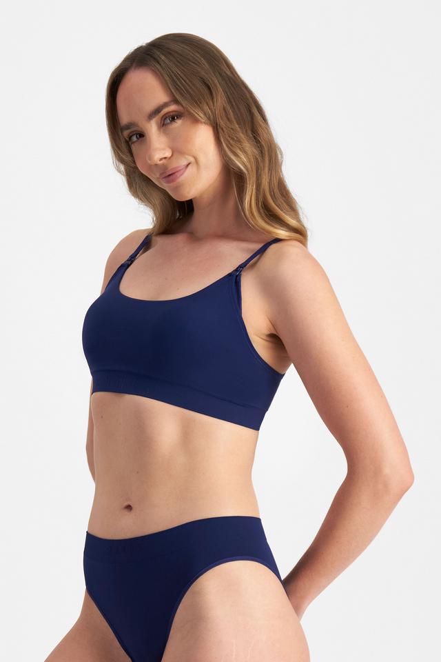 Mikaela (She/Her) wears size 12B and is 177cm tall with 89cm chest and 66cm waist