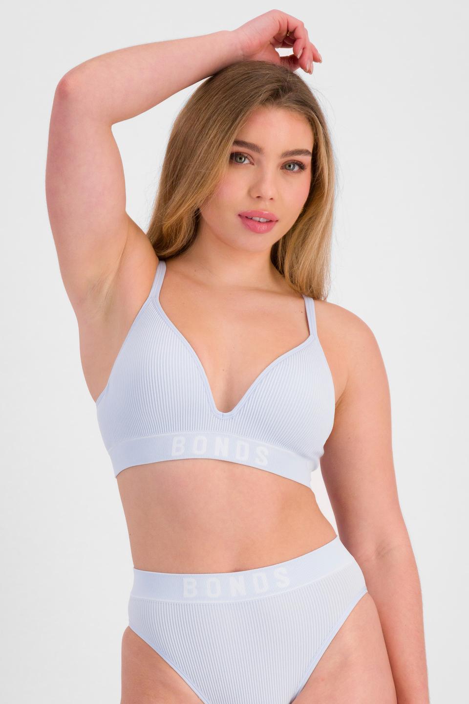 Sienna (She/Her) wears size 12 and is 164cm tall with cm chest and 71cm waist