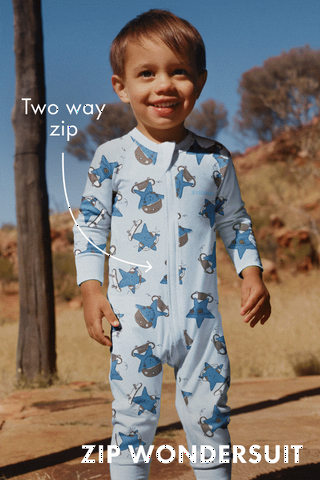 Two way zip. Made with comfy cotton. Cuffable hands and feet. Red nose approved for safer sleep.